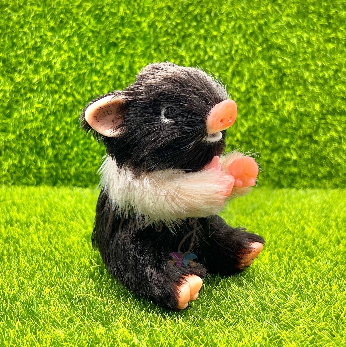 Sitting Oreo Biscuit Piglet Holding Milk Bottle